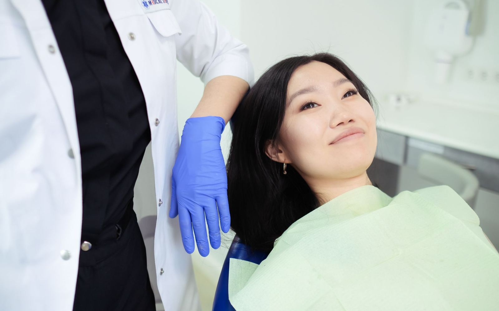 A smiling patient during a dental visit