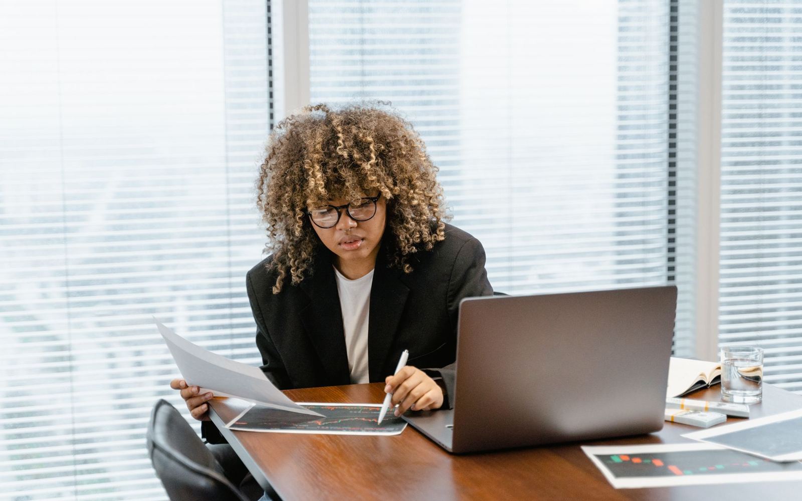A business owner reviewing figures at a desk